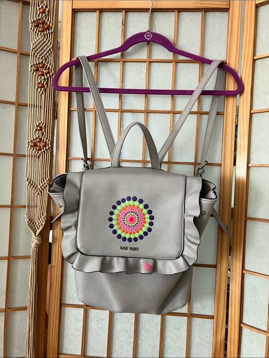 Nine West Handbags - EUC Nine West Light Gray Backpack with Multicolor Dot Medallion 12x10x5